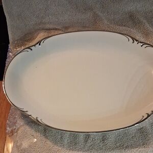 Sophisticated Cream Oval Platter with Silver Detailing